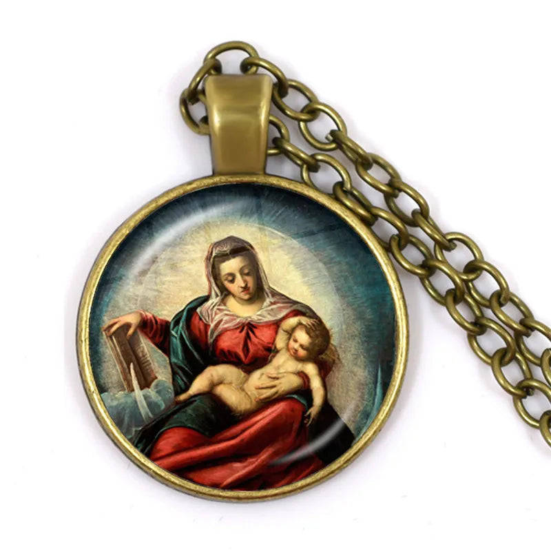 Pendant with religious scene on a chain against a white background