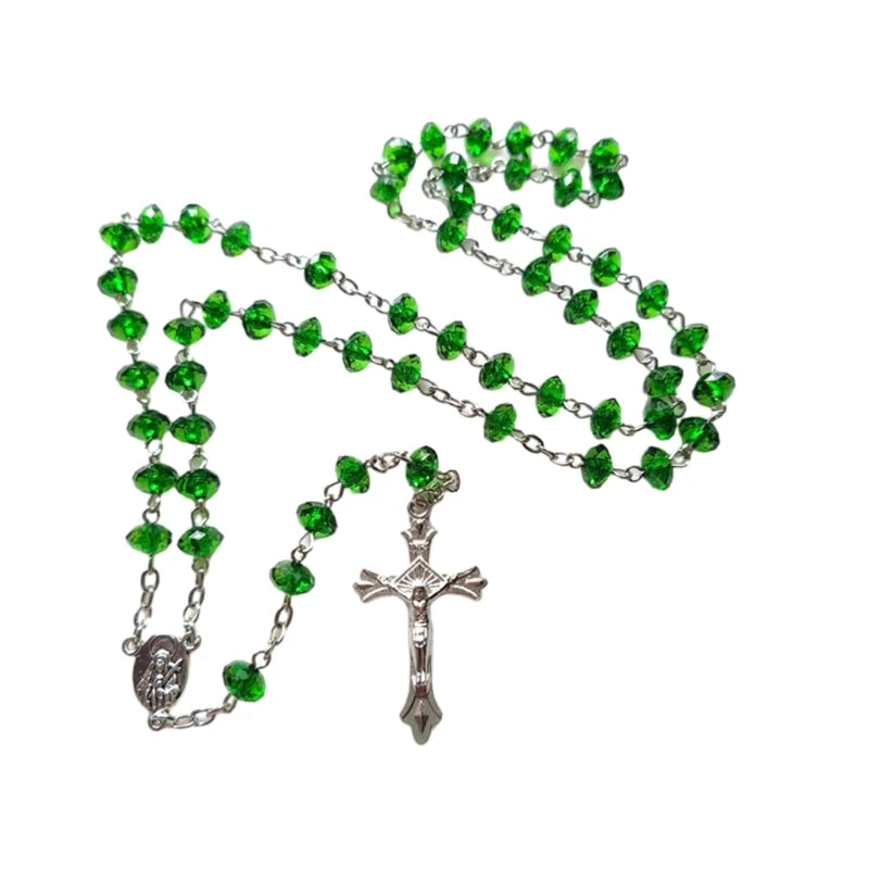 Green rosary with a silver cross on a white background
