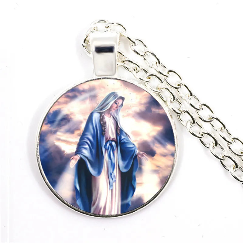 Pendant with religious figure design on a white background