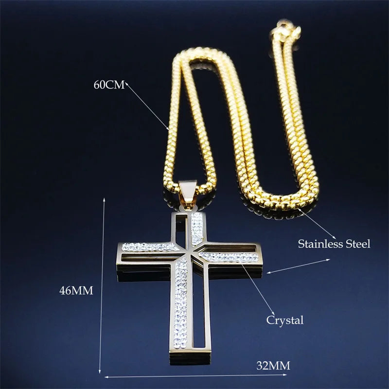 Gold chain with a silver cross pendant on a dark background