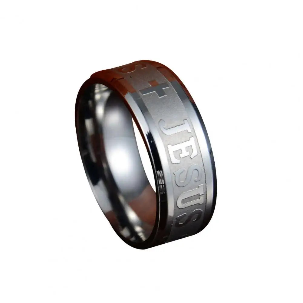 Silver ring with 'Jesus' engraving on a white background