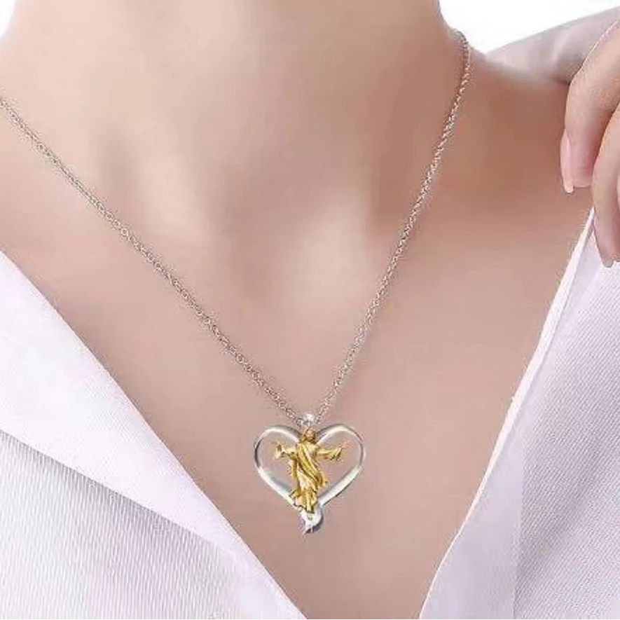 Necklace with a heart-shaped pendant featuring a gold figure on a white background