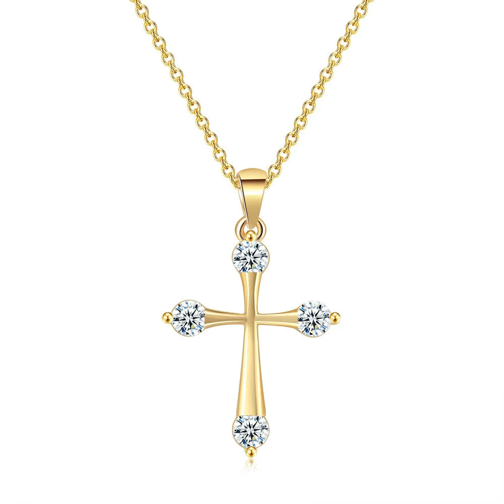 Gold cross necklace with diamonds on a white background