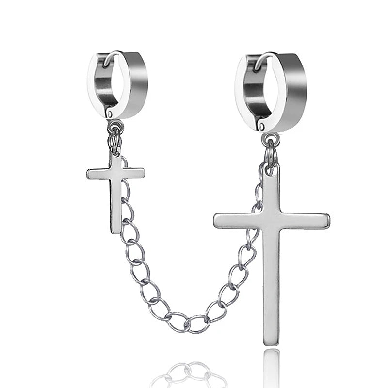 Pair of silver hoop earrings with cross pendants on a white background