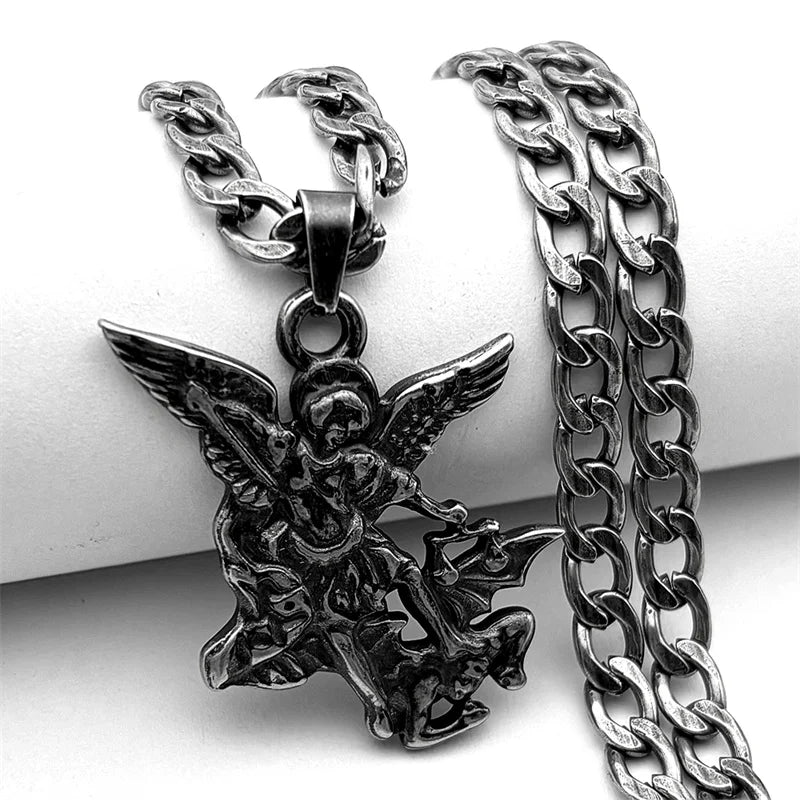 Silver chain with an angel pendant on a white background