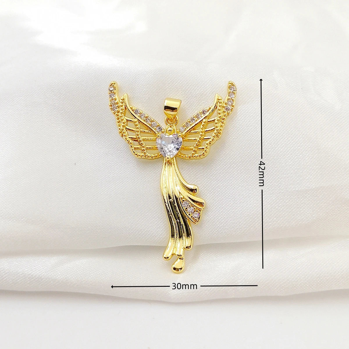 Gold angel pendant with measurements on a white background