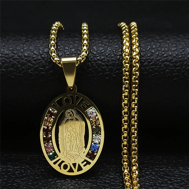 Gold pendant with chain on a black textured background