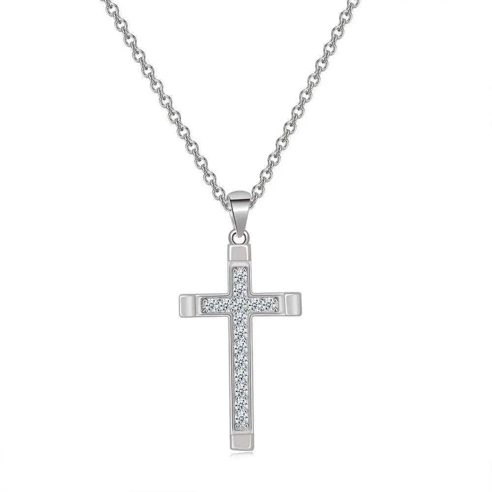Silver cross pendant necklace on a white background