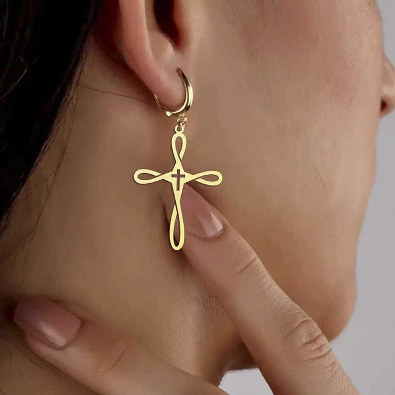Gold colour cross-shaped earring, sound charged
