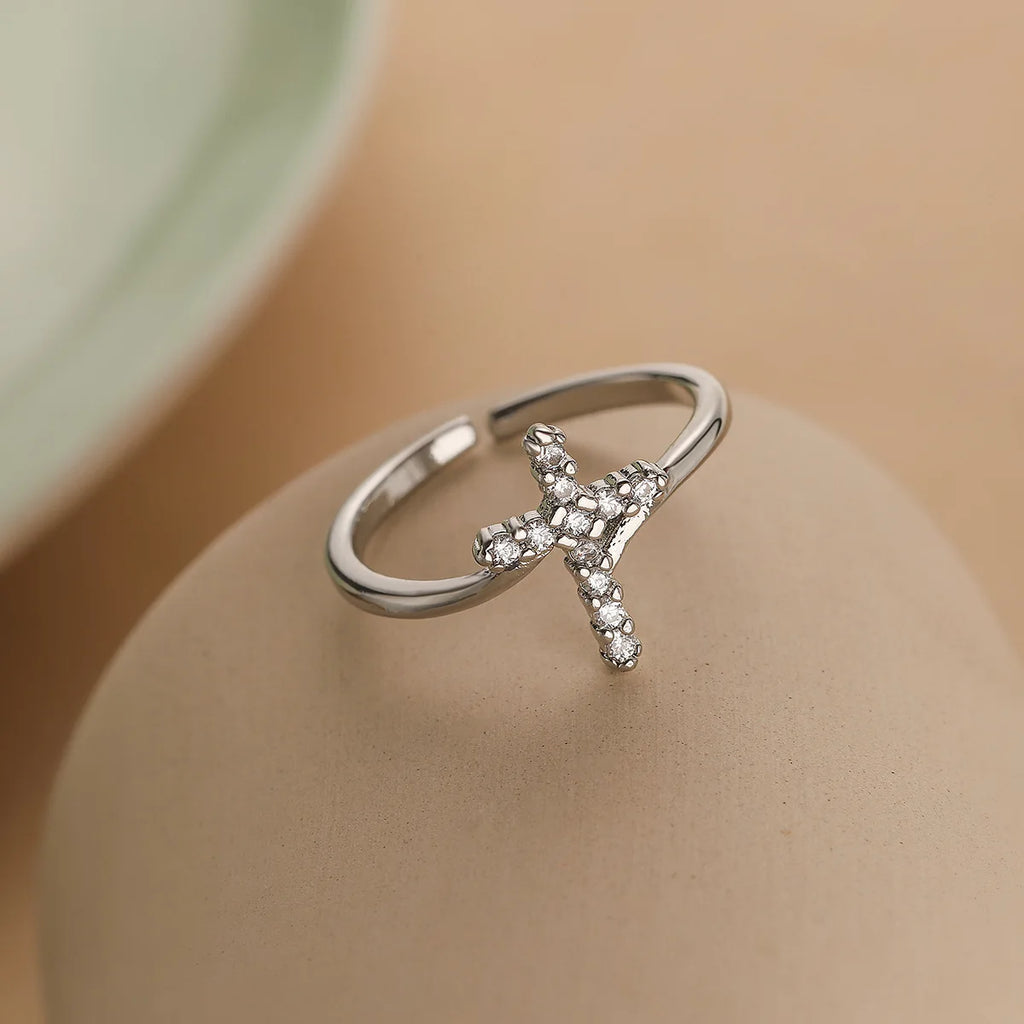 Brilliant Devotion: The Zircon Cross Ring Range