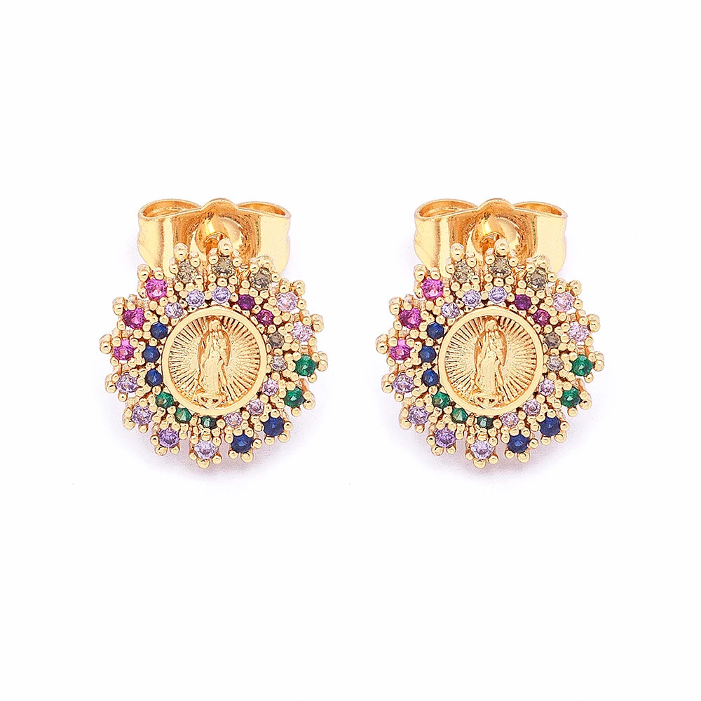 Gold earrings with colorful gemstones on a white background