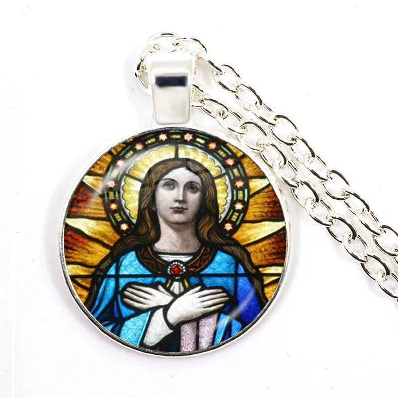 Pendant with a religious figure design on a white background