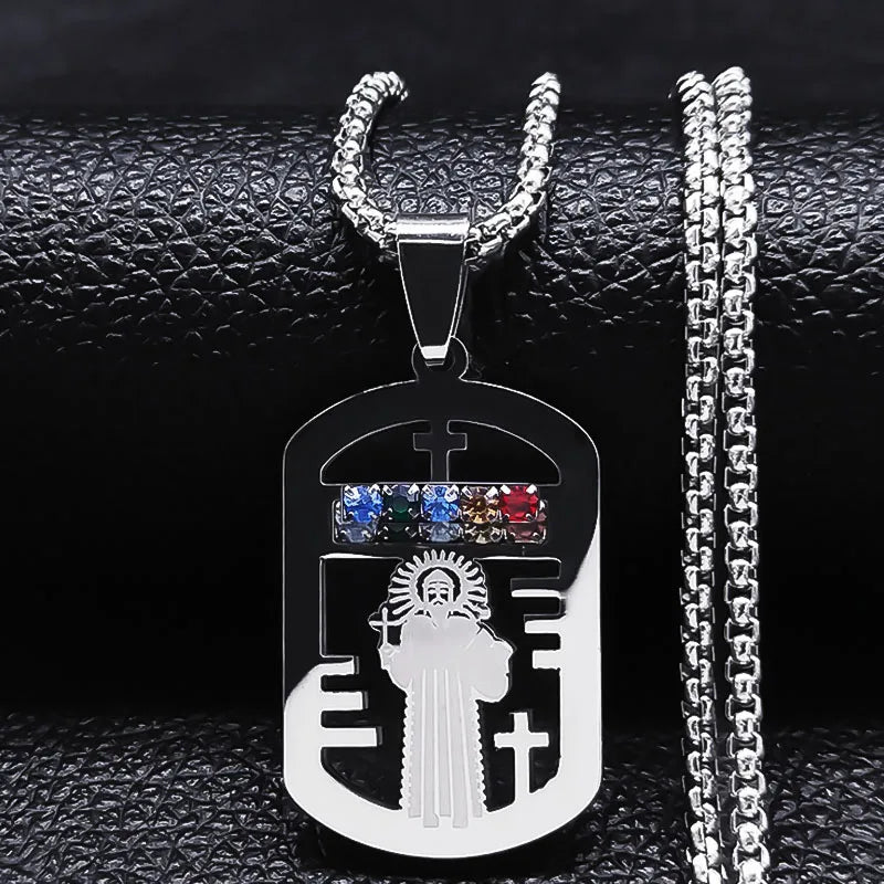 Silver pendant with religious design and colorful stones