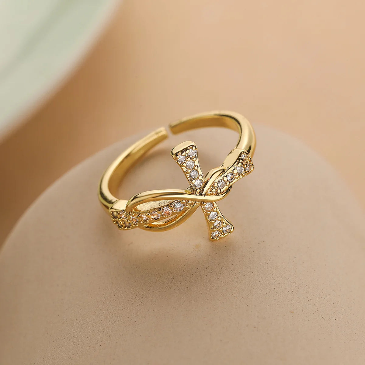 Brilliant Devotion: The Zircon Cross Ring Range