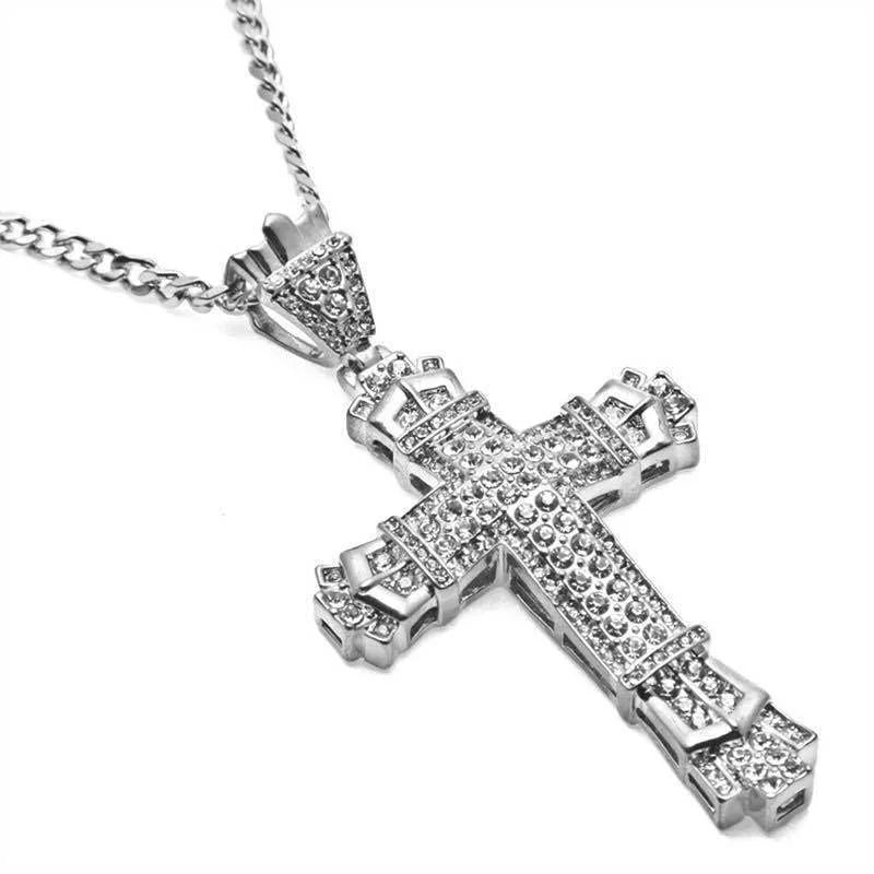 Silver cross pendant necklace on a white background