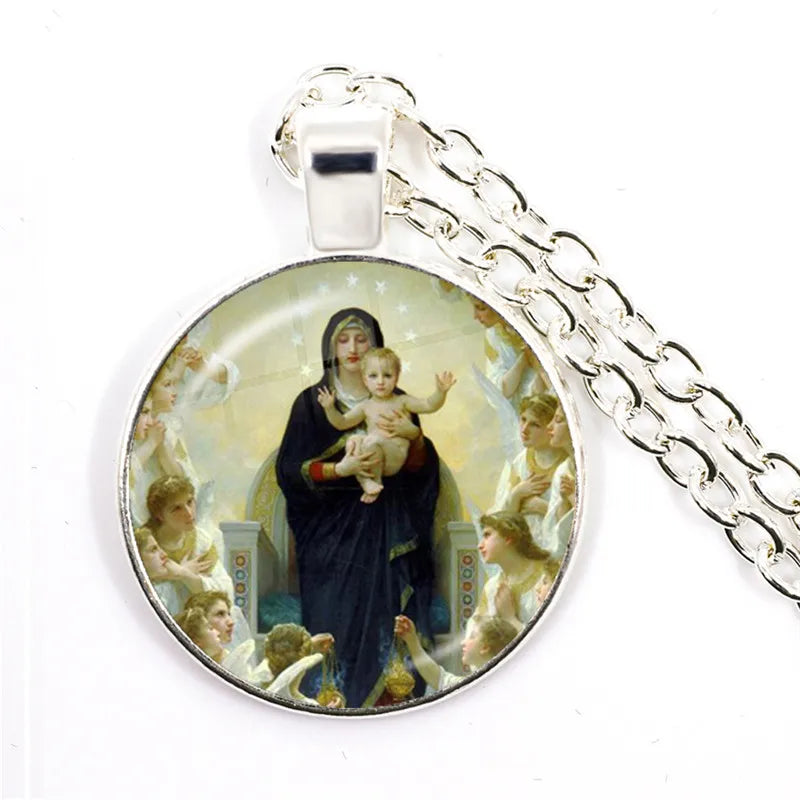 Pendant with religious design of a woman holding a child surrounded by angels on a white background.