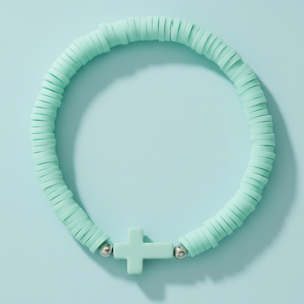 Mint Green cross bracelet with clay heishi beads – sound-charged faith jewellery for everyday wear