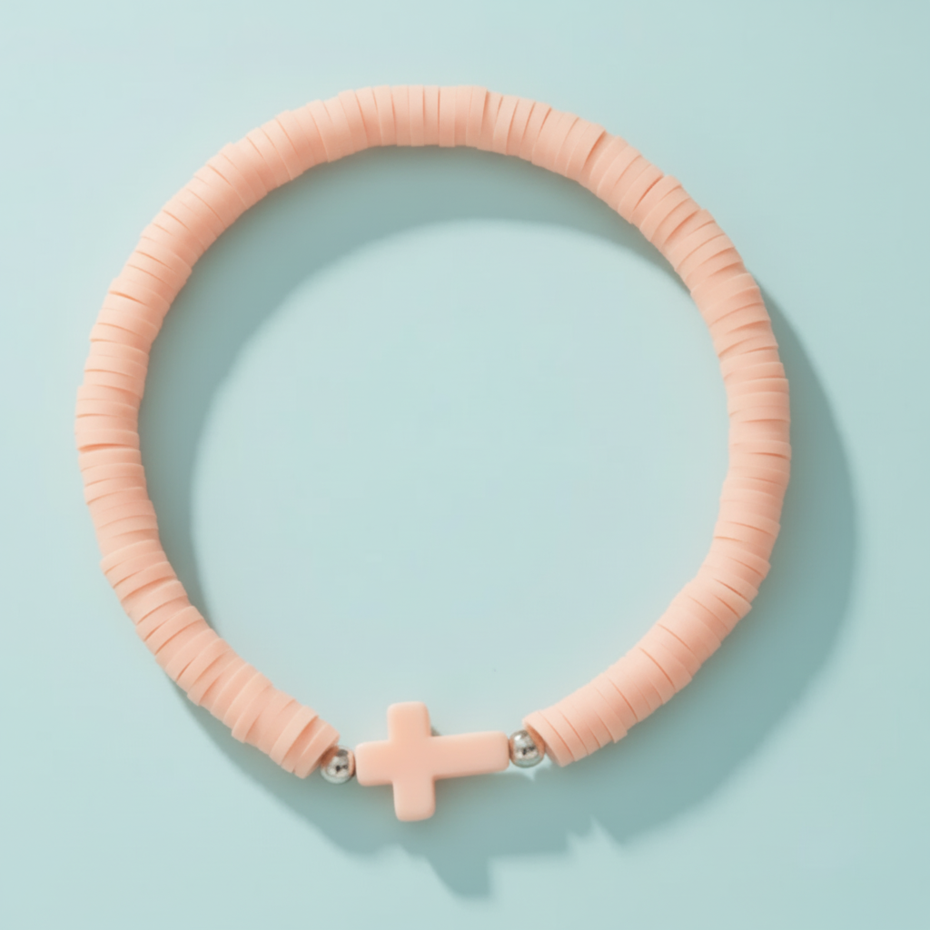 Cross bracelet with clay heishi beads – sound-charged faith jewellery for everyday wear