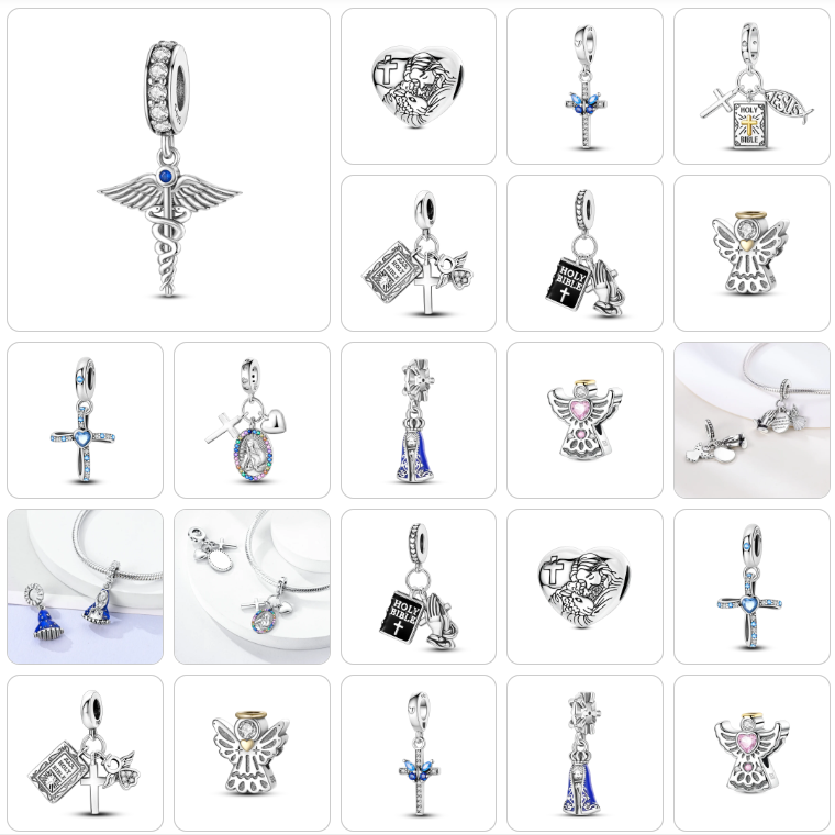 Collection of various silver charms on a white background