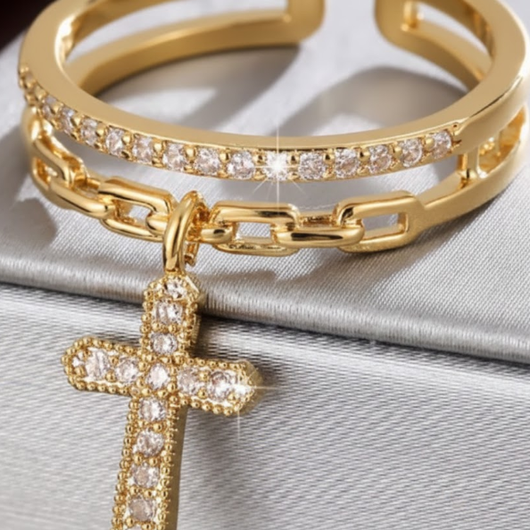 Gold colour ring with CZ accents and a cross pendant, sound charged