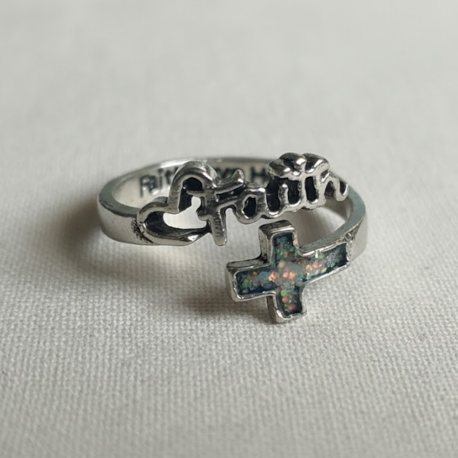 Silver ring with a cross, faith and heart design, sound-charged.