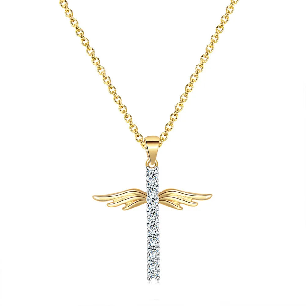 Gold necklace with a pendant shaped like wings on a white background