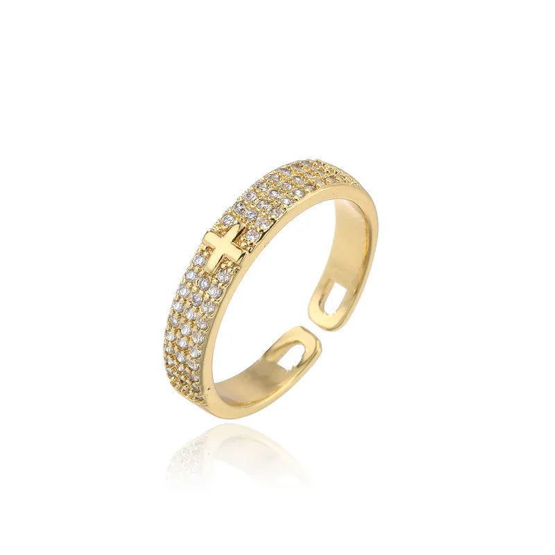 Brilliant Devotion: The Zircon Cross Ring Range