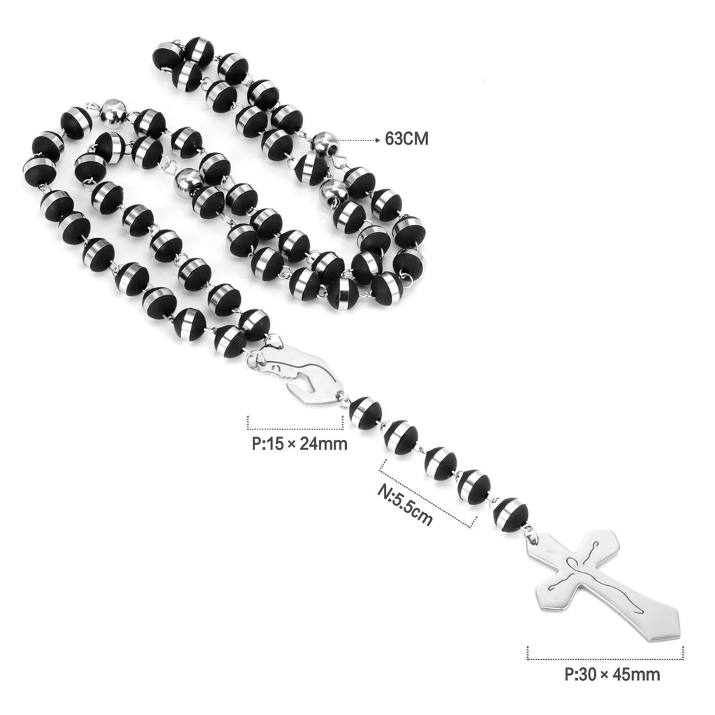 Black and silver beaded necklace with a cross pendant on a white background