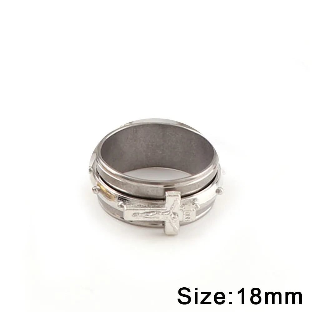Silver ring with engraved design on a white background