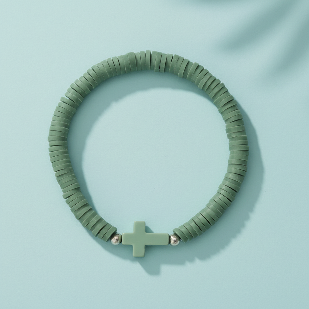 Green beaded Everyday Faith pastel Heishi bead stretchy bracelet with a subtle acrylic cross charm, featuring soft pink, apricot, and mint green polymer clay beads. Ideal casual spiritual Jewellery for stacking, sound charged, Australian, RuHa Spirit, Rapid Delivery