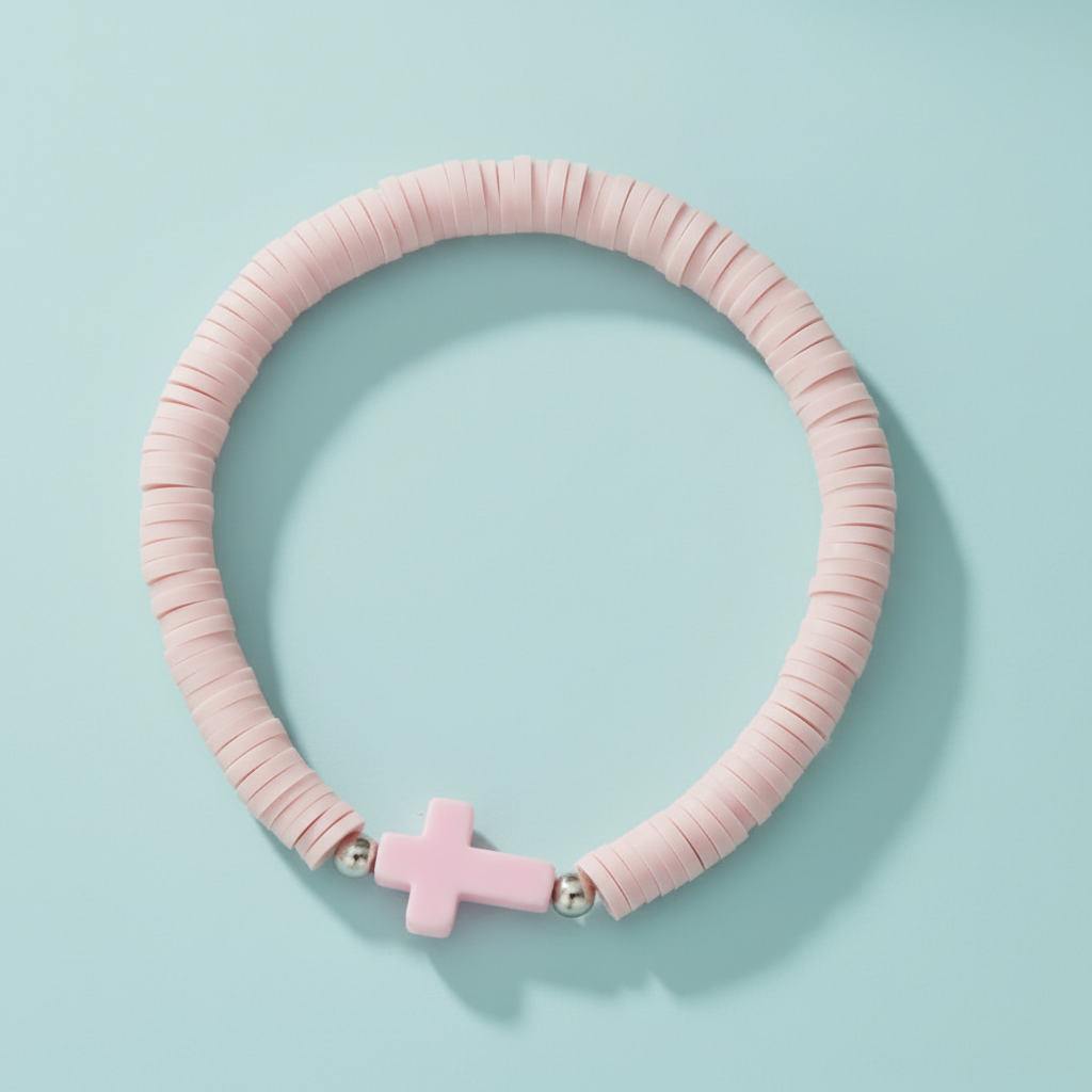 Pink beaded Everyday Faith pastel Heishi bead stretchy bracelet with a subtle acrylic cross charm, featuring soft pink, apricot, and mint green polymer clay beads. Ideal casual spiritual Jewellery for stacking, sound charged, Australian, RuHa Spirit, Rapid Delivery