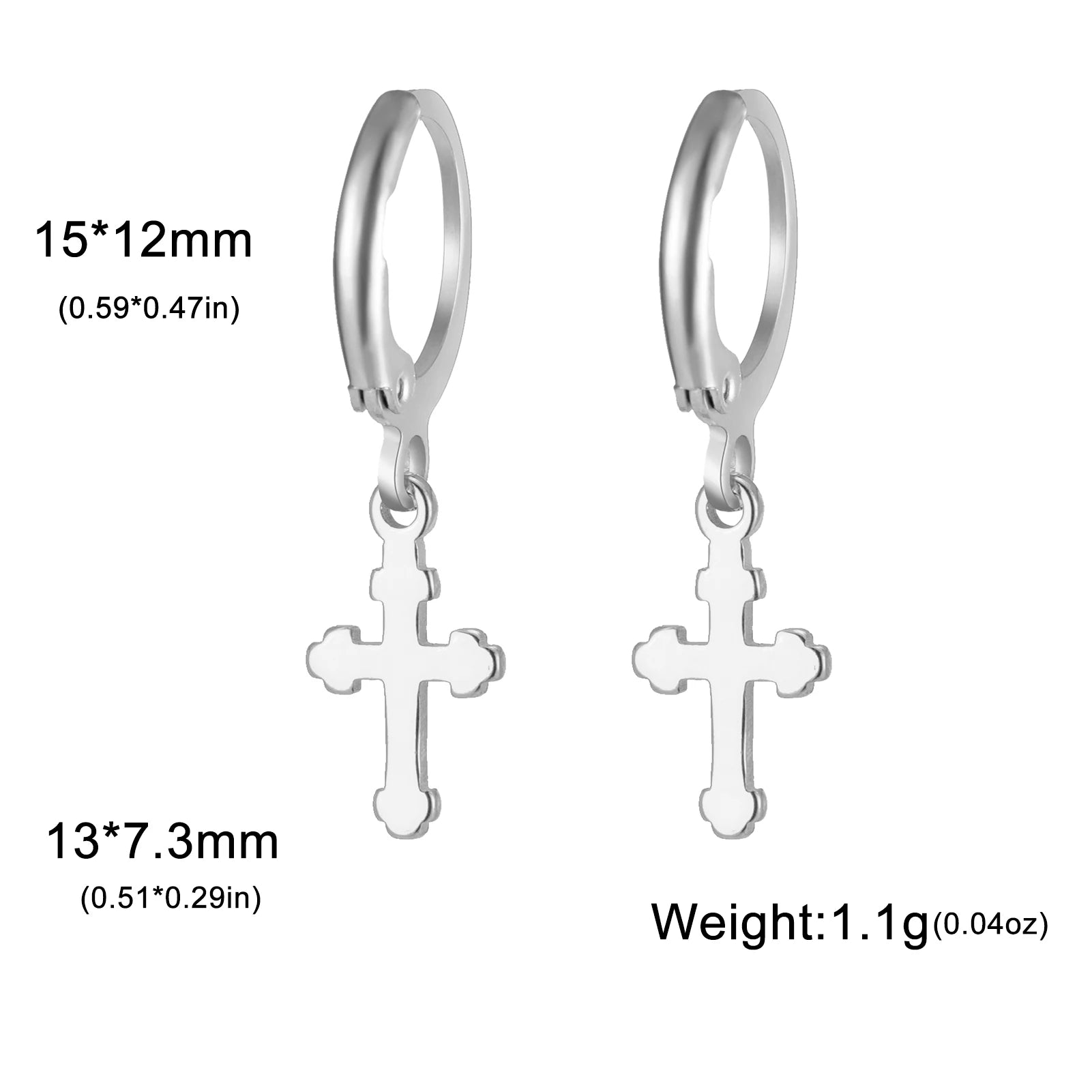 Silver hoop earrings with cross pendants on a white background