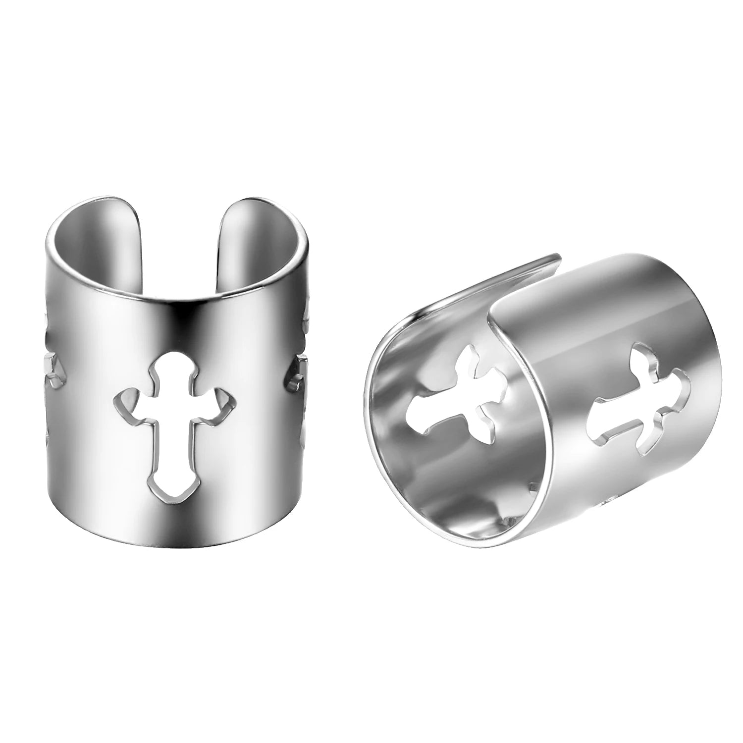 Pair of silver cuff bracelets with cross designs on a white background