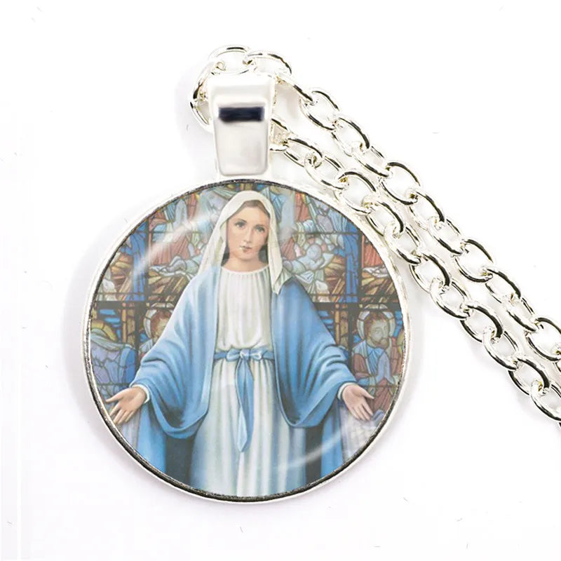Round pendant with a religious figure design on a white background