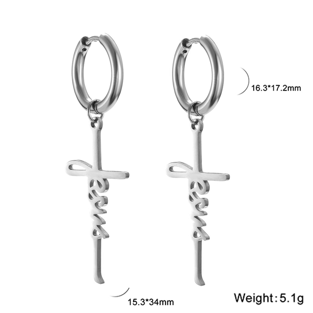 Silver hoop earrings with cross designs on a white background